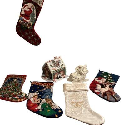 ROHU532 Needlepoint Stockings And Lighted Gingerbread House And Sleigh	5 stockings, 4 are needlepoint with velvet backing. Gingerbread...