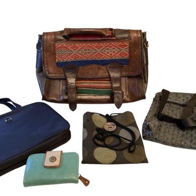 ROHU536 Accessories For The Funky Traveler	Weathered leather and tapestry briefcase with long leather shoulder strap for crossbody ease;...