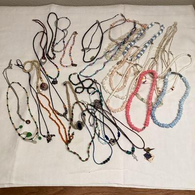 ROHU577 Collection Of Choker Necklaces, Glass Beads, Shells, Natural Materials	Lots of shells, glass, metal, rope
