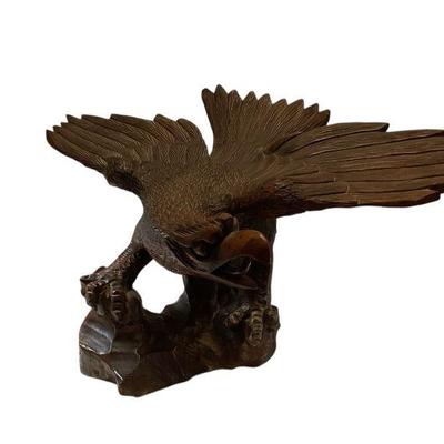 ROHU520 Hand Carved Wooden Eagle	14" high with wing span of 25". Weighs 9lbs.  
