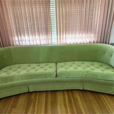 Mid Century Globe Curved Tufted Sofa .jpg