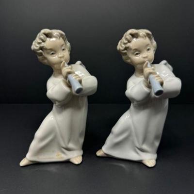 A Pair Of Lladró "Angel w/ Flute" Figurines	