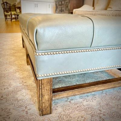 Pale Tiffany blue leather ottoman with nailhead trim