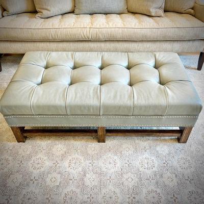 Pale Tiffany blue leather ottoman with nailhead trim