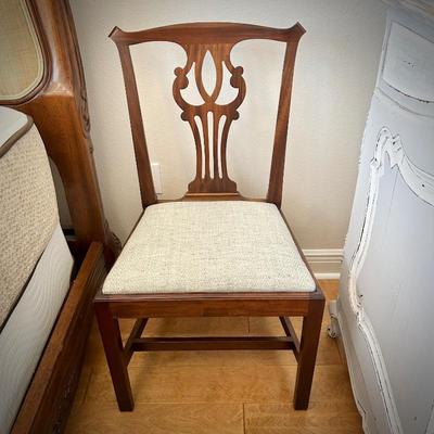 One of five vintage Chippendale-style chairs. Seats removable for recovering.
