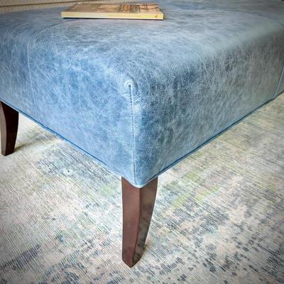 Blue leather ottoman