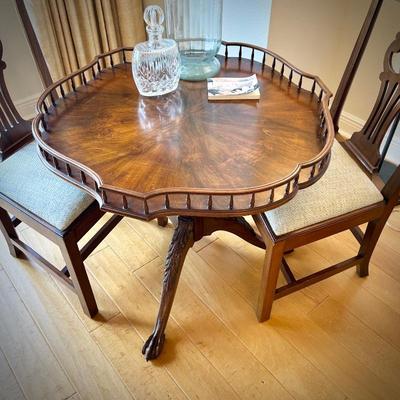 Wellington Hall scalloped octagon table with claw feet