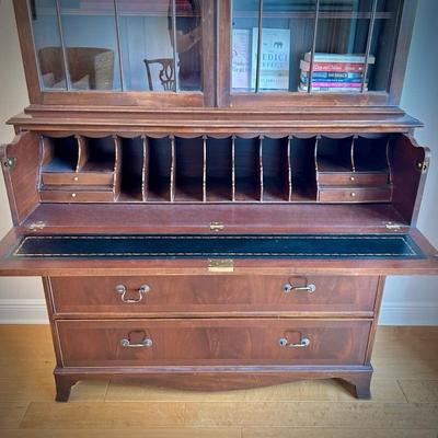 Antique mahogany secretary. Desk portion with leather inlay rolls out. Two pieces for easy transportation.