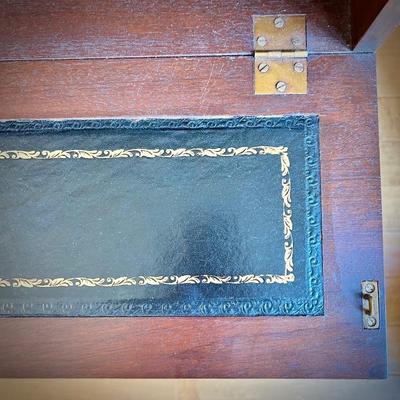 Antique mahogany secretary. Desk portion with leather inlay rolls out. Two pieces for easy transportation.