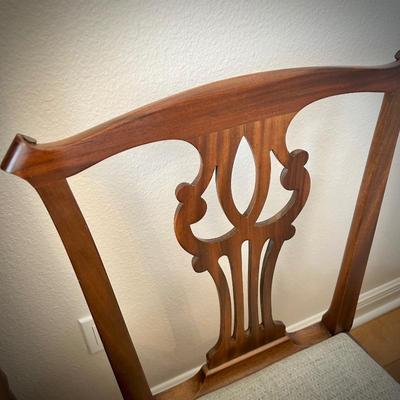 One of five vintage Chippendale-style chairs. Seats removable for recovering.
