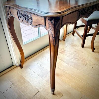 Louis XV-style carved table