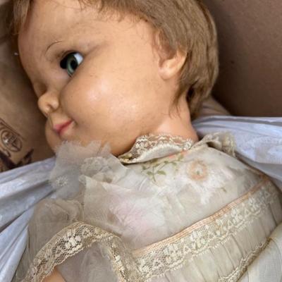 Several antique dolls...