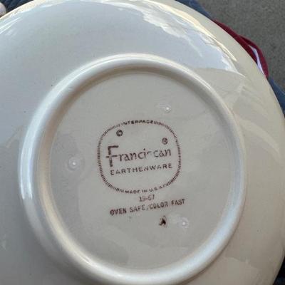 Several well stored plates, saucers, cups, gravy boat and more, text for an exact count.