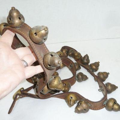 several antique sleigh bells