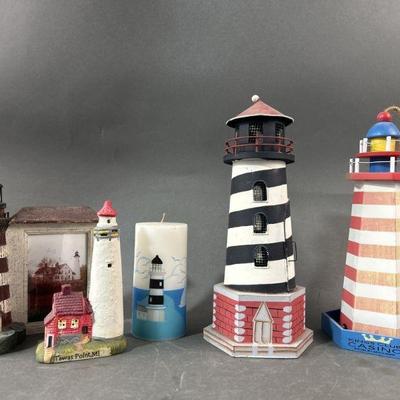 Lot 414 | Lighthouse Themed Lot Candle Holder, Candle & More
