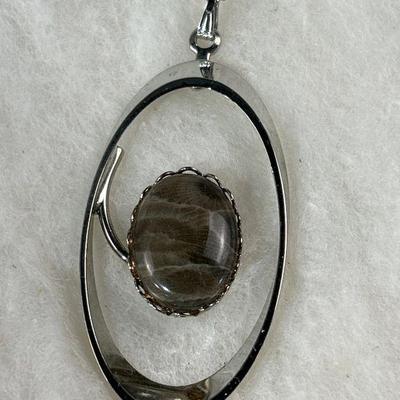 Lot 335 | Fossil Stone Pendant Silver Tone Necklace

