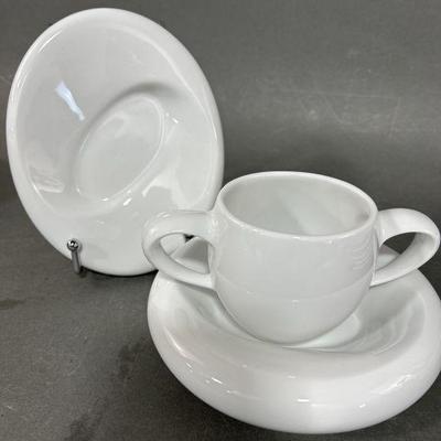 Lot 194 | Nambe Saucers & Cup
