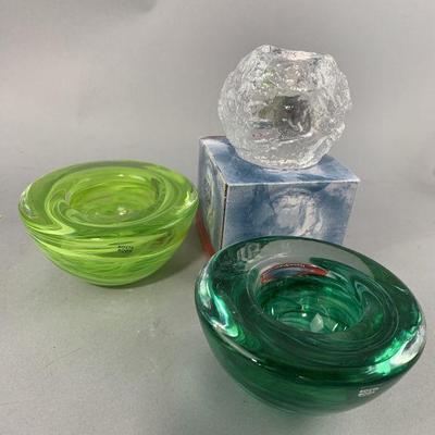 Lot 137 | Kosta Boda Candle Holders Green Swirl & Snowball
