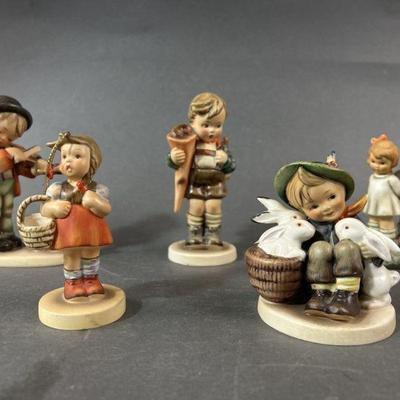 Lot 374 | Four Hummel & A Schmid Figurines
