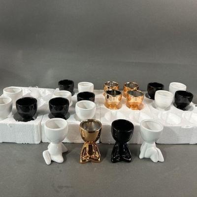 Lot 372 | 21 Mini Planters In Relaxed Poses
