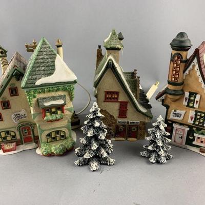 Lot 420 | Department 56 North Pole Series Ceramic Buildings

