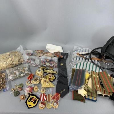 Lot 267 | Military Buttons, Badges, Tank Helmet, & More!
