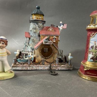 Lot 419 | Kincade Porcelain Light Up Lighthouse & More
