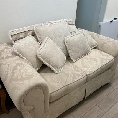 White cream love seat
