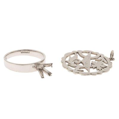 Two Platinum Jewelry Items
