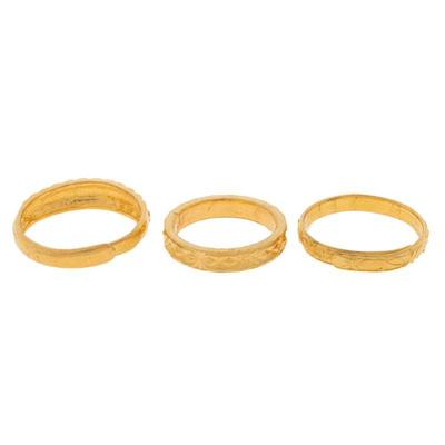Collection of Three 24k, 22k Yellow Gold Rings