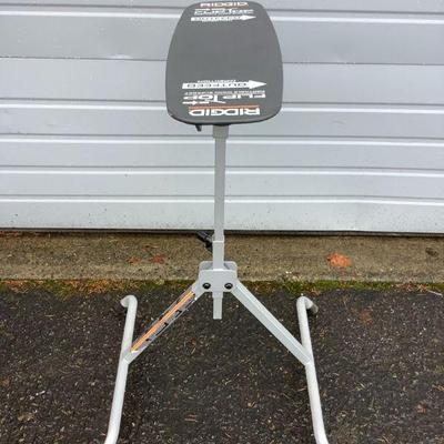 TEWA617 RIGID Flip Table	This adjustable flip table has a 250lbs limit and adjusts height from 27" to 45". 
