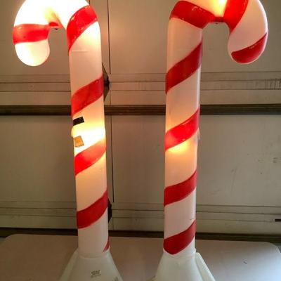 TICA613 Candy Cane Lot 1	Plugged in outdoor decor candy canes, two in this lot. Tested and works as shown.
