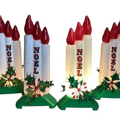 TICA716 Vintage Empire Plastic Noel Candles Blow Mold	Set of 4 candles, all in working condition. 1 glows brighter due to a new bulb. 
