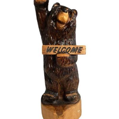 LEMO502 Carved Wood Bear	Carved Wood Bear with reversible "welcome/go away" sign. Small mark on platform. 23" tall x...