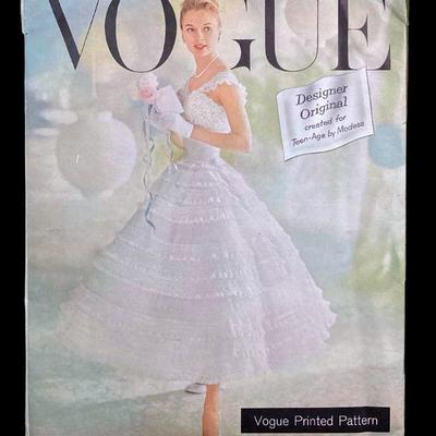 LUGR702 Rare Vintage Vogue Pattern “Chantilly Dress”	1957 Chantilly dress pattern, size 12. The pattern is cut but complete and useable.
