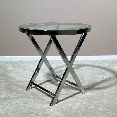 CHROME & GLASS SIDE TABLE | Modern end table having a chrome faux folding design with a round glass top. - h. 20 x dia. 20 in

