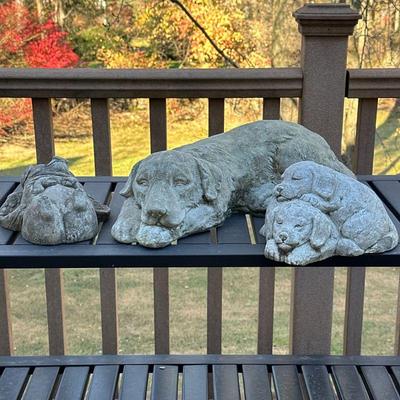 (3pc) CONCRETE GARDEN STATUES | Including: large dog figurine, pair of puppies, and pig with wings. - h. 4 x w. 8 x l. 20 in (largest)

