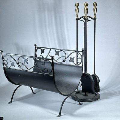 FIREPLACE TOOL SET | Including brass handled four piece fireplace tools, plus a wrought iron log Holder; tools height, 29 inches. - h. 17...