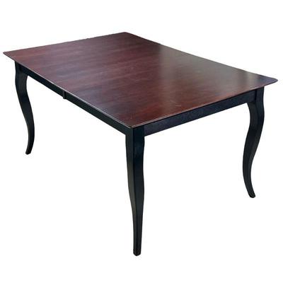 BURMEX EXTENDING LEAF DINING TABLE | Made in Canad, a Bermex carved wood extending leaf dining table with a dark wood top over black...