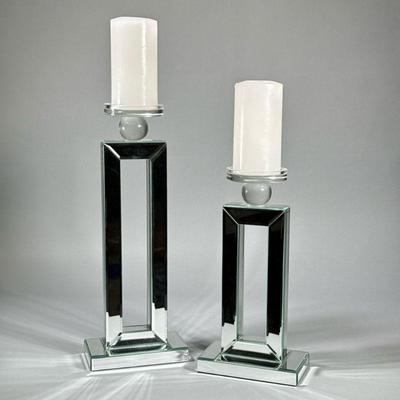 (2pc) PAIR MIRRORED CANDLESTICKS | Pair of contemporary rectangular mirrored candle votive holders with round glass tops, labeled on the...