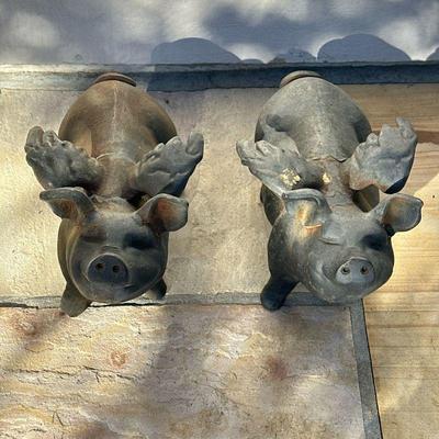 (2pc) PAIR CAST IRON PIGS WITH WINGS | Garden decoration: a pair of cast iron black-painted pigs with wings. - h. 8.5 x w. 6.5 x l. 13 in

