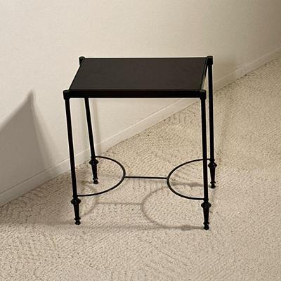 WROUGHT IRON STONE TOP MINI TABLE | Small side table with a black stone top on a black wrought iron base with shaped stretcher. - h. 18 x...