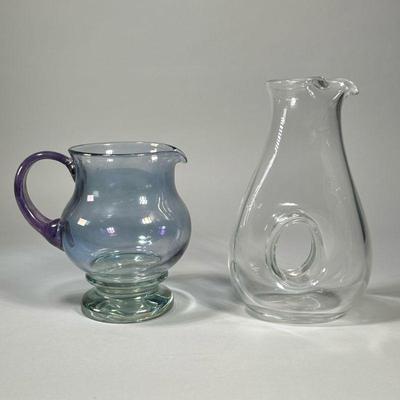 (2pc) GLASS PITCHER & DECANTER | Including a multi-color glass handled pitcher and a clear glass decanter of modern design. - h. 10.5...