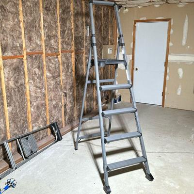 ALUMINUM POWDER COATED LADDER | Top step approximately 56 inches with a higher grab bar. - h. 87 x w. 24 x d. 7 in (folded)

