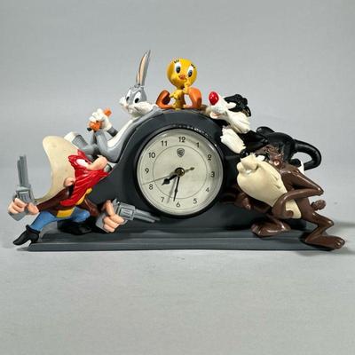VINTAGE WB MANTEL CLOCK | Warner brothers mantle clock with character figures surrounding the case. - h. 6.5 x w. 13 x d. 4 in

