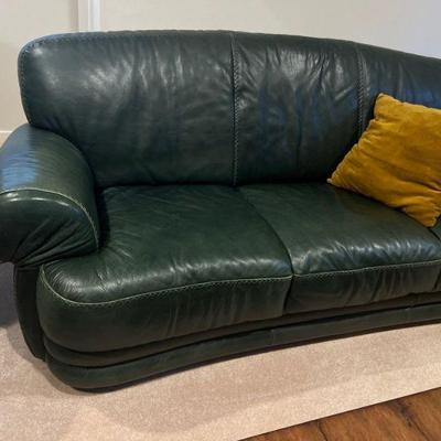 green leather love seat