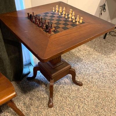 Antique  tip top game table w/ pedestal base.