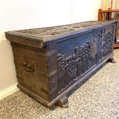 Antique  Continental chest w/ carved scenes  of castles and soldiers