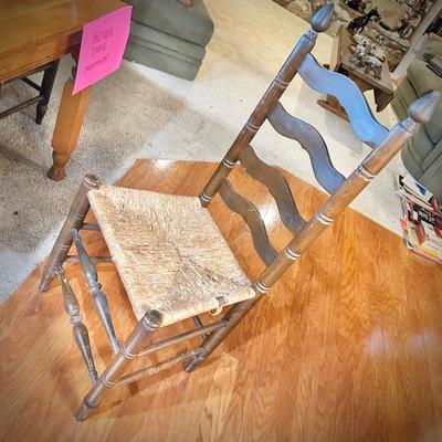 Antique table and 4 ladder back chairs with rush seats
