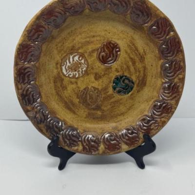 Hand made glazed pottery display plate